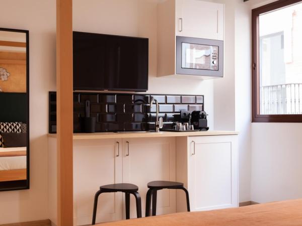 Welldone Sierpes Boutique : photo 9 de la chambre chambre lit king-size deluxe