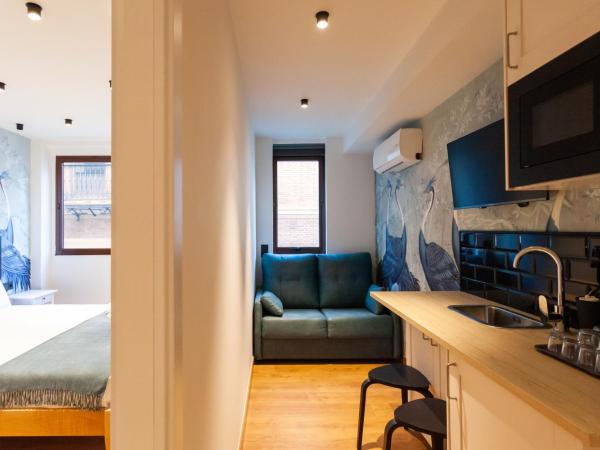 Welldone Sierpes Boutique : photo 6 de la chambre chambre triple exécutive