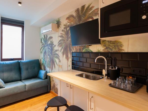 Welldone Sierpes Boutique : photo 10 de la chambre chambre triple exécutive