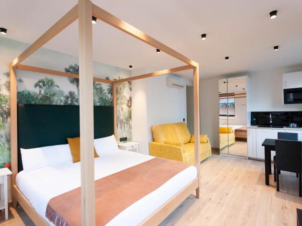 Welldone Sierpes Boutique : photo 3 de la chambre grande chambre supérieure