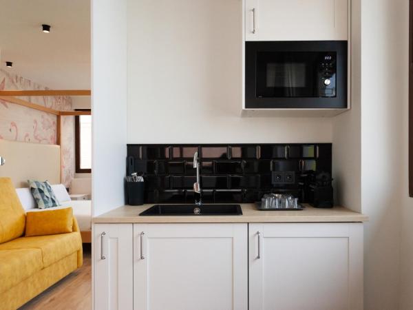 Welldone Sierpes Boutique : photo 7 de la chambre grande chambre supérieure