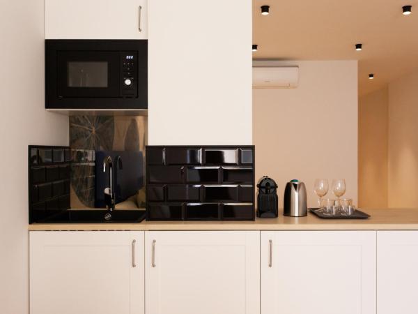 Welldone Sierpes Boutique : photo 7 de la chambre suite lit queen-size