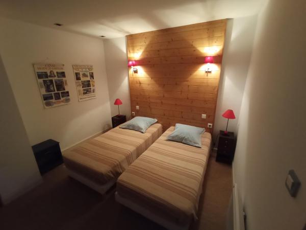 Le clos d'André : photo 1 de la chambre chambre lits jumeaux avec salle de bains privative