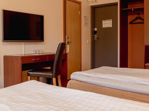 First Hotel Jörgen Kock : photo 4 de la chambre chambre triple Économique