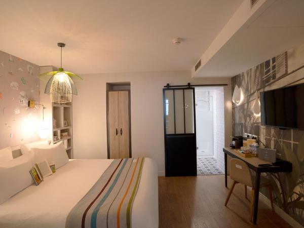 Hotel Litteraire Marcel Ayme, BW Premier Collection : photo 4 de la chambre appartement lit king-size avec cuisine