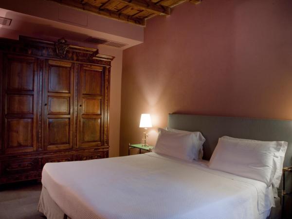Maison Borella : photo 2 de la chambre chambre double ou lits jumeaux de luxe - annexe