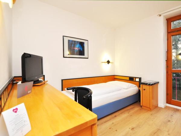 Villa Waldperlach by Blattl : photo 10 de la chambre grande chambre simple 