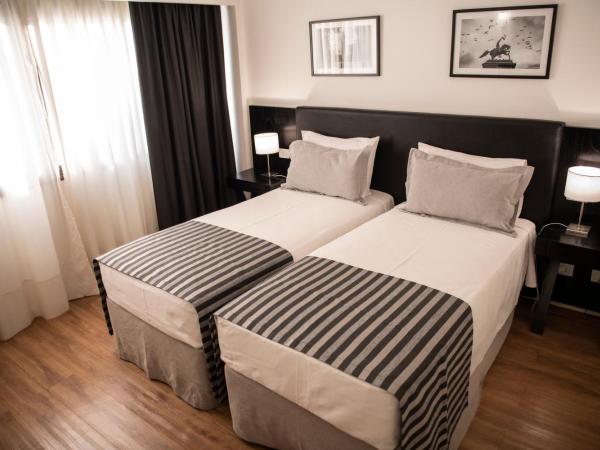 Grand King Hotel : photo 9 de la chambre chambre lits jumeaux classique