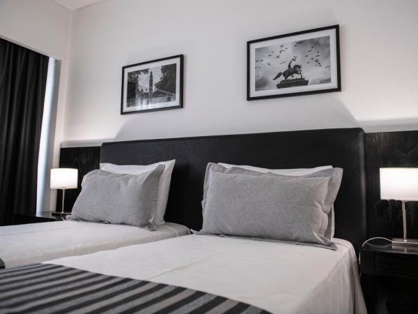 Grand King Hotel : photo 8 de la chambre chambre lits jumeaux classique