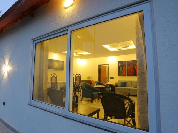 Family Vacay In Green Settings : photo 8 de la chambre appartement - vue sur jardin