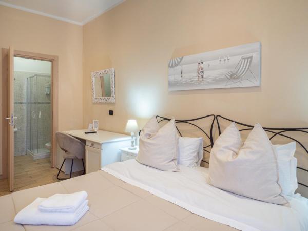Affittacamere Lunamar : photo 3 de la chambre chambre double ou lits jumeaux avec salle de bains privative