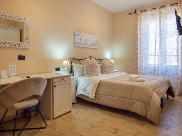 Affittacamere Lunamar : photo 5 de la chambre chambre double ou lits jumeaux avec salle de bains privative
