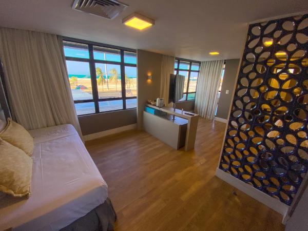 Magna Praia Hotel : photo 1 de la chambre suite avec balcon