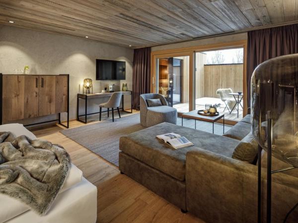Alpenhotel Kitzbühel am Schwarzsee - 4 Sterne Superior : photo 1 de la chambre suite avec sauna