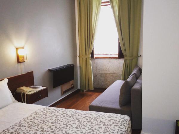 Hotel Jardim Viana do Castelo : photo 1 de la chambre chambre double avec lit d'appoint