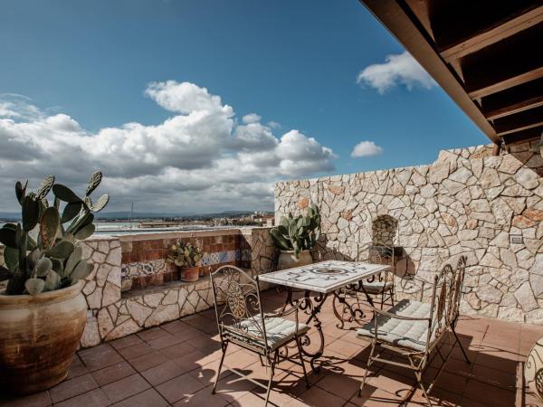 Palazzo Giunta - Porta Marina Ortigia : photo 5 de la chambre suite romantique avec terrasse - vue sur mer