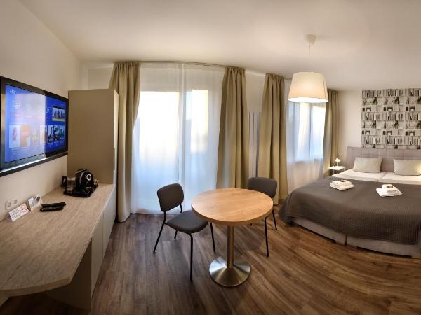 Hotel Bürgerhof : photo 3 de la chambre appartement avec balcon
