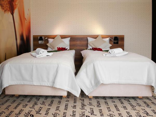 Hotel Piano : photo 4 de la chambre chambre lits jumeaux