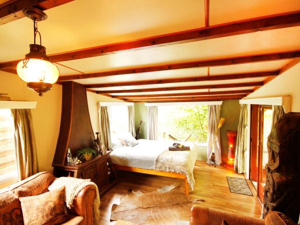 Bamboo Lodge Groningen : photo 10 de la chambre chambre double - vue sur jardin