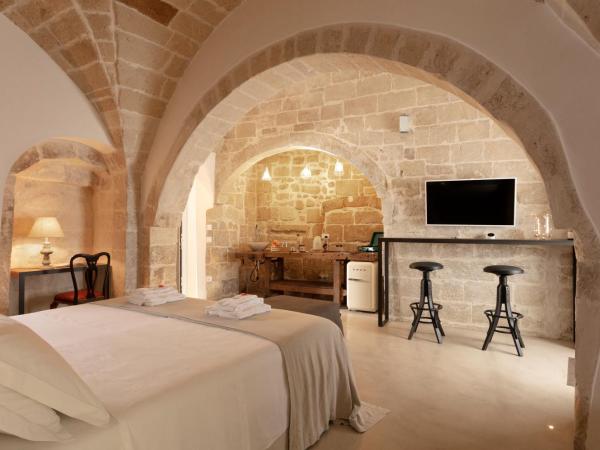 Palazzo Sant'Anna Lecce : photo 5 de la chambre suite lit queen-size avec baignoire spa