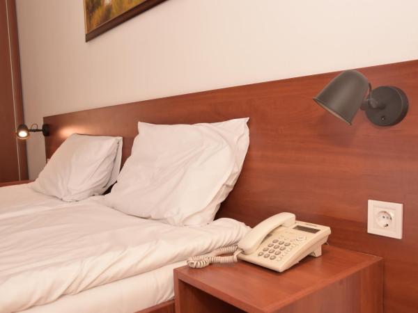 Triple M Hotel : photo 9 de la chambre chambre triple