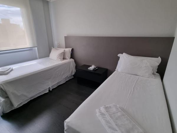Hotel Gran Vivenzo Belo Horizonte : photo 4 de la chambre chambre lits jumeaux pour personnes à mobilité réduite