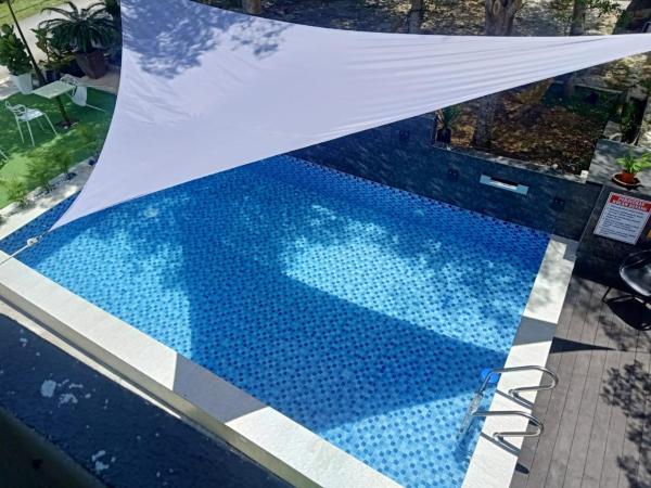 Tc theme park Guest house : photo 7 de la chambre chambre lits jumeaux avec balcon