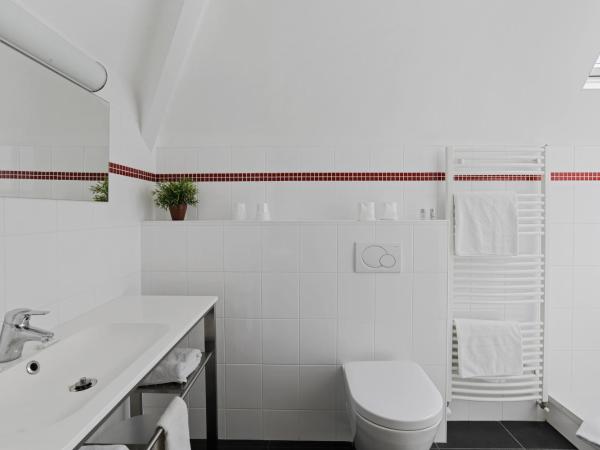 Hôtel Cardinal : photo 3 de la chambre chambre triple