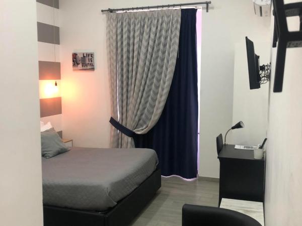 Napoli DownTown : photo 1 de la chambre chambre double