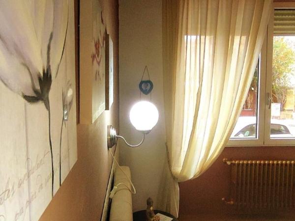 Aedes B&B Il Giardino dei Sogni : photo 2 de la chambre grande chambre double 