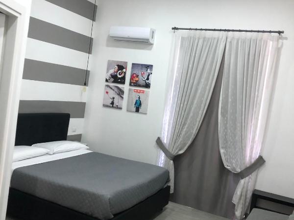 Napoli DownTown : photo 1 de la chambre grande chambre double