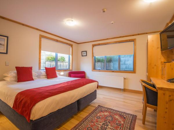 Coronation Lodge : photo 1 de la chambre chambre lit king-size