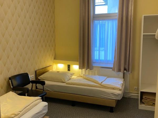ALPHA Hotel Garni : photo 1 de la chambre chambre lits jumeaux standard