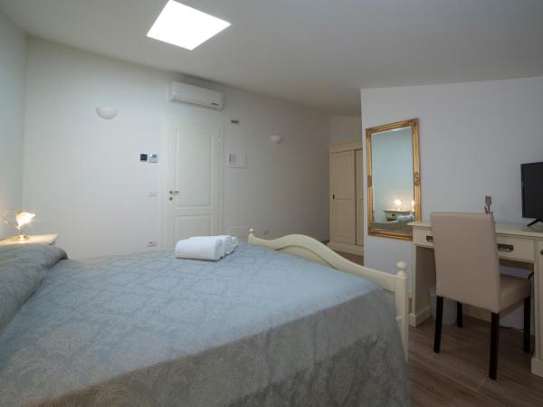 Agriturismo Corte Rondinella : photo 1 de la chambre chambre quadruple