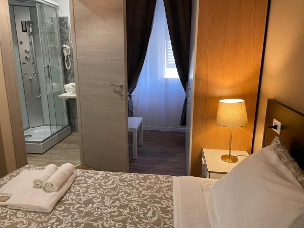 Domus La Foce Hotel : photo 4 de la chambre chambre double ou lits jumeaux avec salle de bains privative