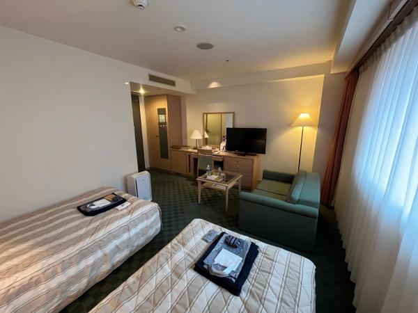 Jasmac Plaza Hotel : photo 2 de la chambre chambre lits jumeaux - annexe - fumeurs