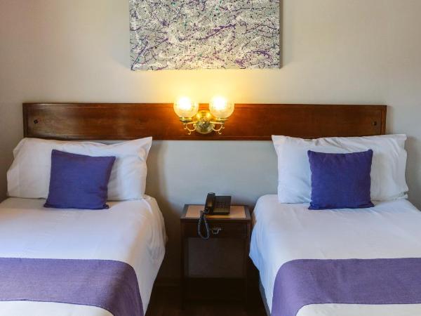 Hotel Concorde : photo 3 de la chambre chambre lits jumeaux - vue sur ville