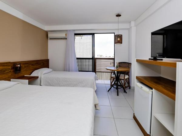 Porto Suítes Natal Hotel : photo 4 de la chambre chambre triple deluxe