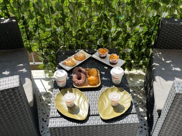 B&B Rosy : photo 3 de la chambre chambre triple avec salle de bains privative séparée