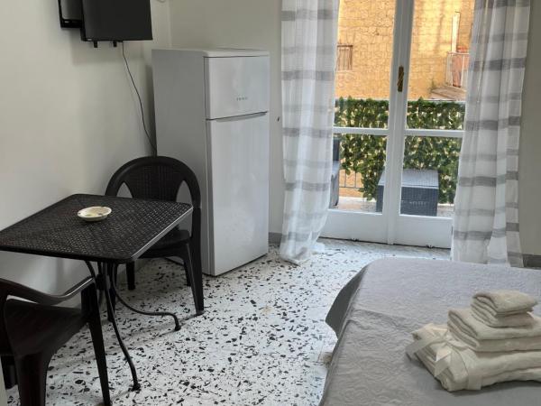 B&B Rosy : photo 6 de la chambre chambre triple avec salle de bains privative séparée