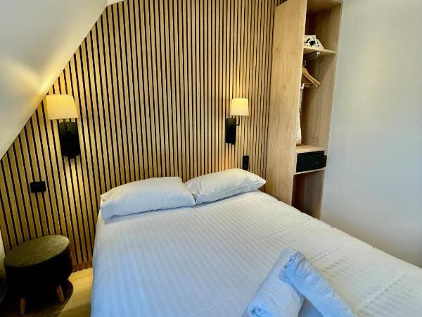 HOTEL AU COEUR DES ARTS ET METIERS : photo 4 de la chambre suite familiale