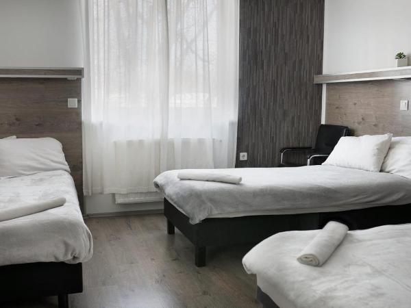 Teke Bowling Centrum és Sport Panzió : photo 1 de la chambre chambre triple