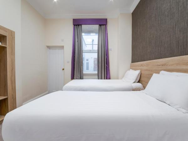 OYO 24 Sussex, London Paddington : photo 3 de la chambre chambre lits jumeaux standard