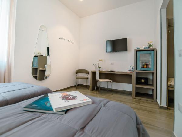 Hotel Bruman Salerno : photo 6 de la chambre grande chambre double ou lits jumeaux