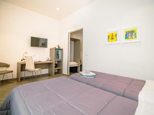 Hotel Bruman Salerno : photo 7 de la chambre grande chambre double ou lits jumeaux
