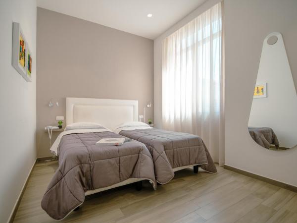 Hotel Bruman Salerno : photo 8 de la chambre grande chambre double ou lits jumeaux