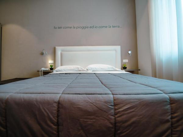 Hotel Bruman Salerno : photo 10 de la chambre chambre triple