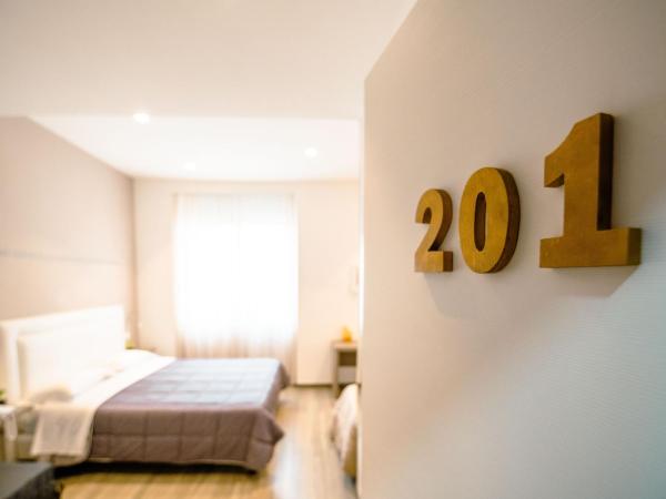 Hotel Bruman Salerno : photo 7 de la chambre chambre triple