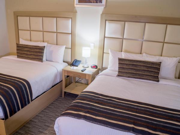 Sleep Inn Monterrey San Pedro : photo 4 de la chambre chambre avec 2 grands lits queen-size