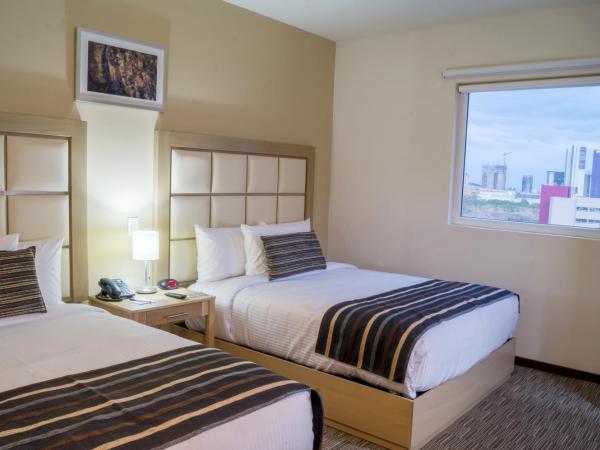 Sleep Inn Monterrey San Pedro : photo 5 de la chambre chambre avec 2 grands lits queen-size